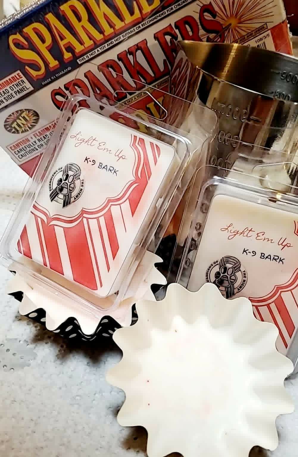 K9 Bark wax melts in clear clamshell packaging